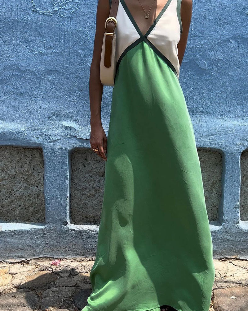 Raina J. – Robe longue élégante à détails contrastants