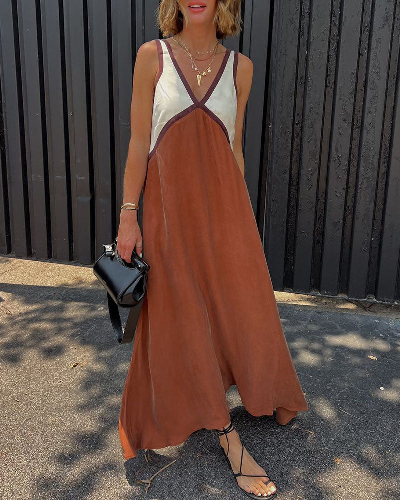 Raina J. – Robe longue élégante à détails contrastants