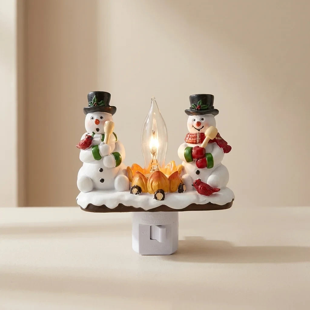 Christmas Night Light with Snowman Campfire Design and Decorative Resin Figures - Image 1