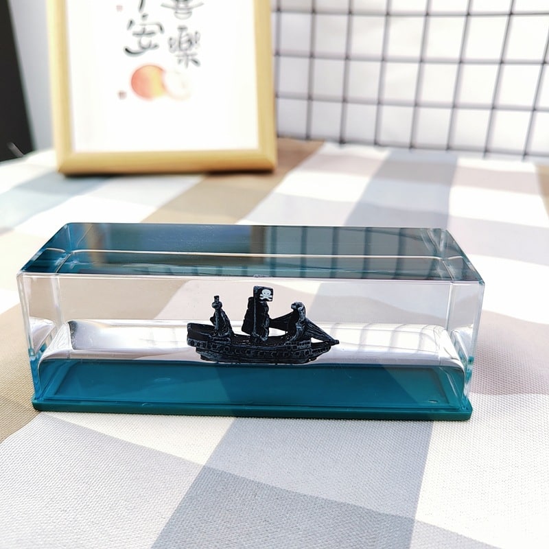 Liquid Wave Paperweight with Floating Ship and LED Light Base - Image 10