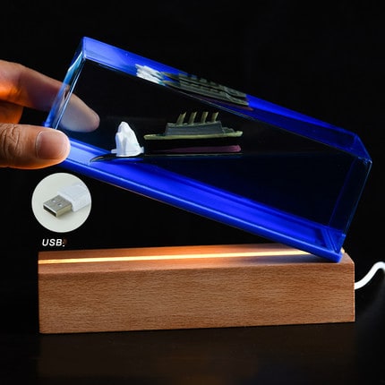 Liquid Wave Paperweight with Floating Ship and LED Light Base - Image 6