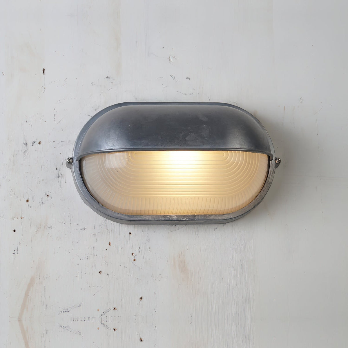 Outdoor Bulkhead Wall Light with Oval Shield and Ribbed Glass Diffuser - Image 46
