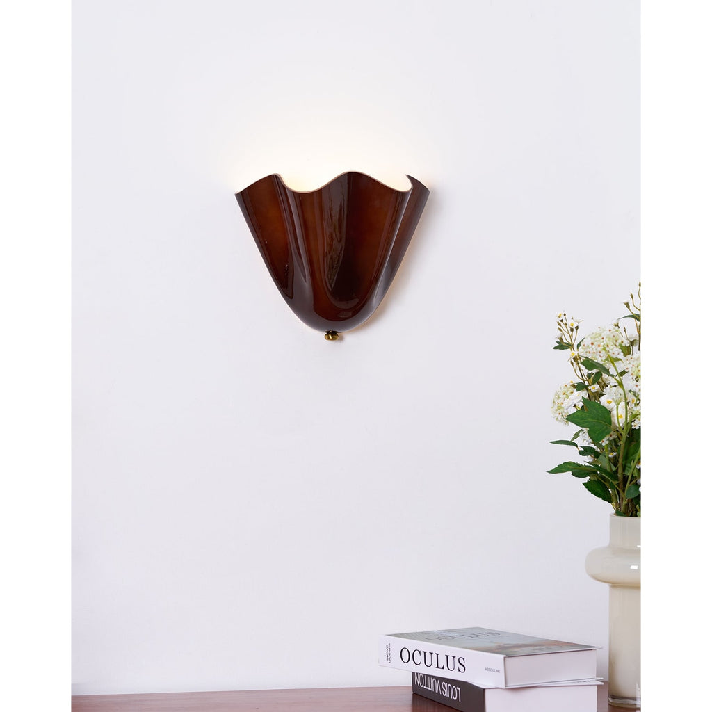 Wall Sconce with Wavy Glass Shade and Warm Ambient Lighting - Image 13