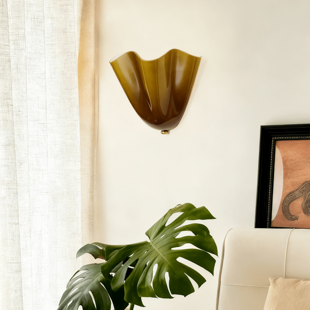 Wall Sconce with Wavy Glass Shade and Warm Ambient Lighting - Image 5