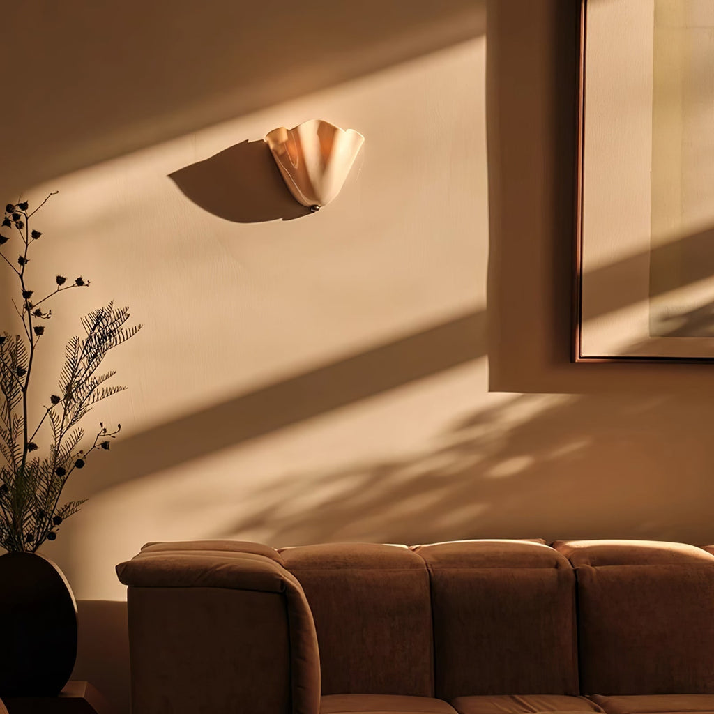 Wall Sconce with Wavy Glass Shade and Warm Ambient Lighting - Image 7