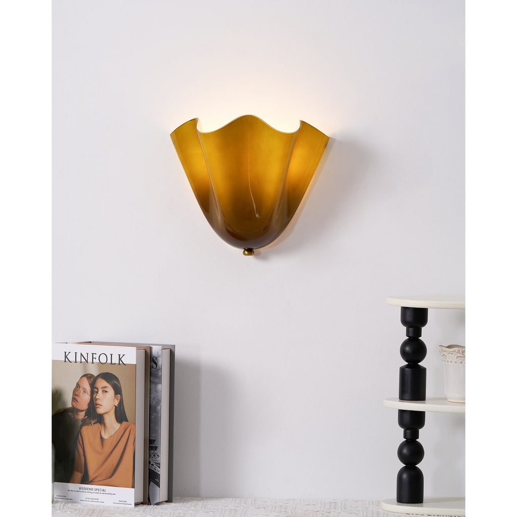 Wall Sconce with Wavy Glass Shade and Warm Ambient Lighting - Image 9